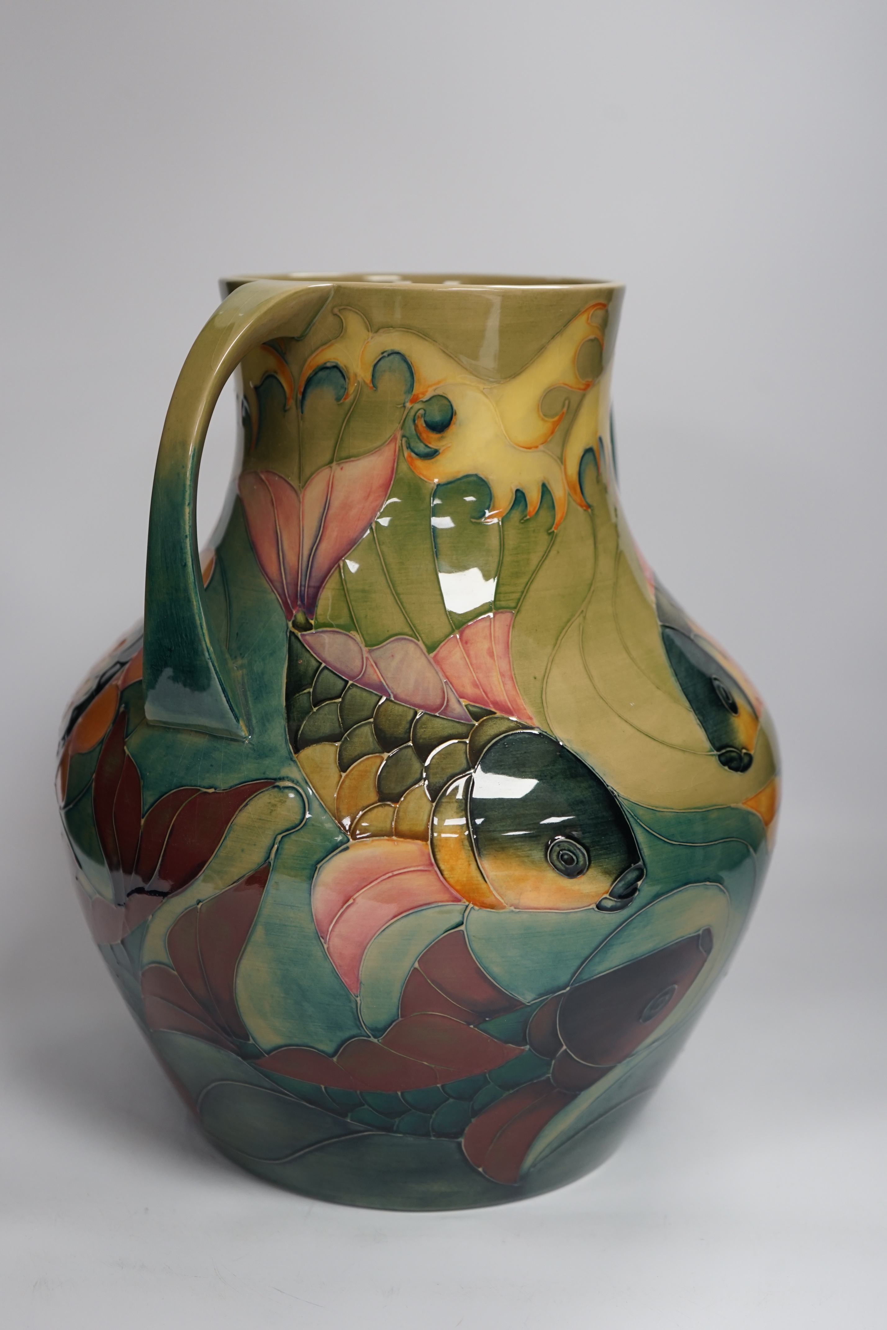 A large Moorcroft twin-handled 'carp' vase, designed by Sally Tuffin, 33cm high